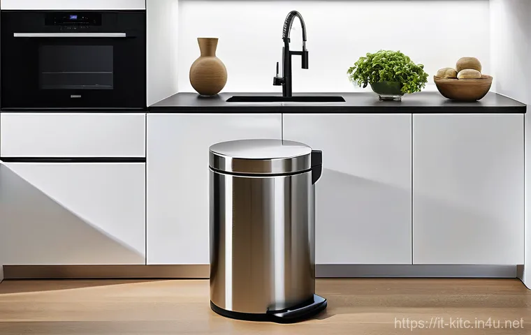 주방 쓰레기통 선택 가이드 - **Prompt:** A high-end, contemporary Italian kitchen featuring sleek, polished stainless steel appli...
